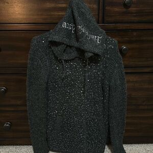 Women’s Casual/Glittery Harley Davidson sweater. Sz ask
